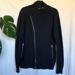 Guess - Black sweater zips up middle to left. Two zip pockets.  Size large